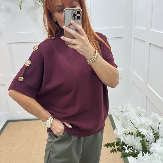 Camille: Burgundy short sleeve gold button top. One Size 12-20