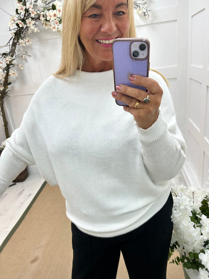 Sammi: White batwing knitted top. One size: 12-18/20