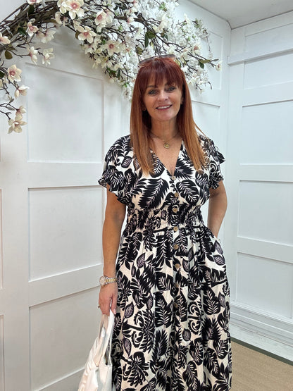 Emmy: Black & white stretchy V neck midi dress. One size: 10-18