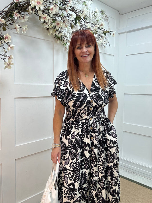 Emmy: Black & white stretchy V neck midi dress. One size: 10-18