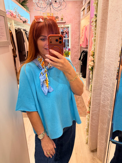 Carrie: Azure blue short knitted top. One size: 12-18/20
