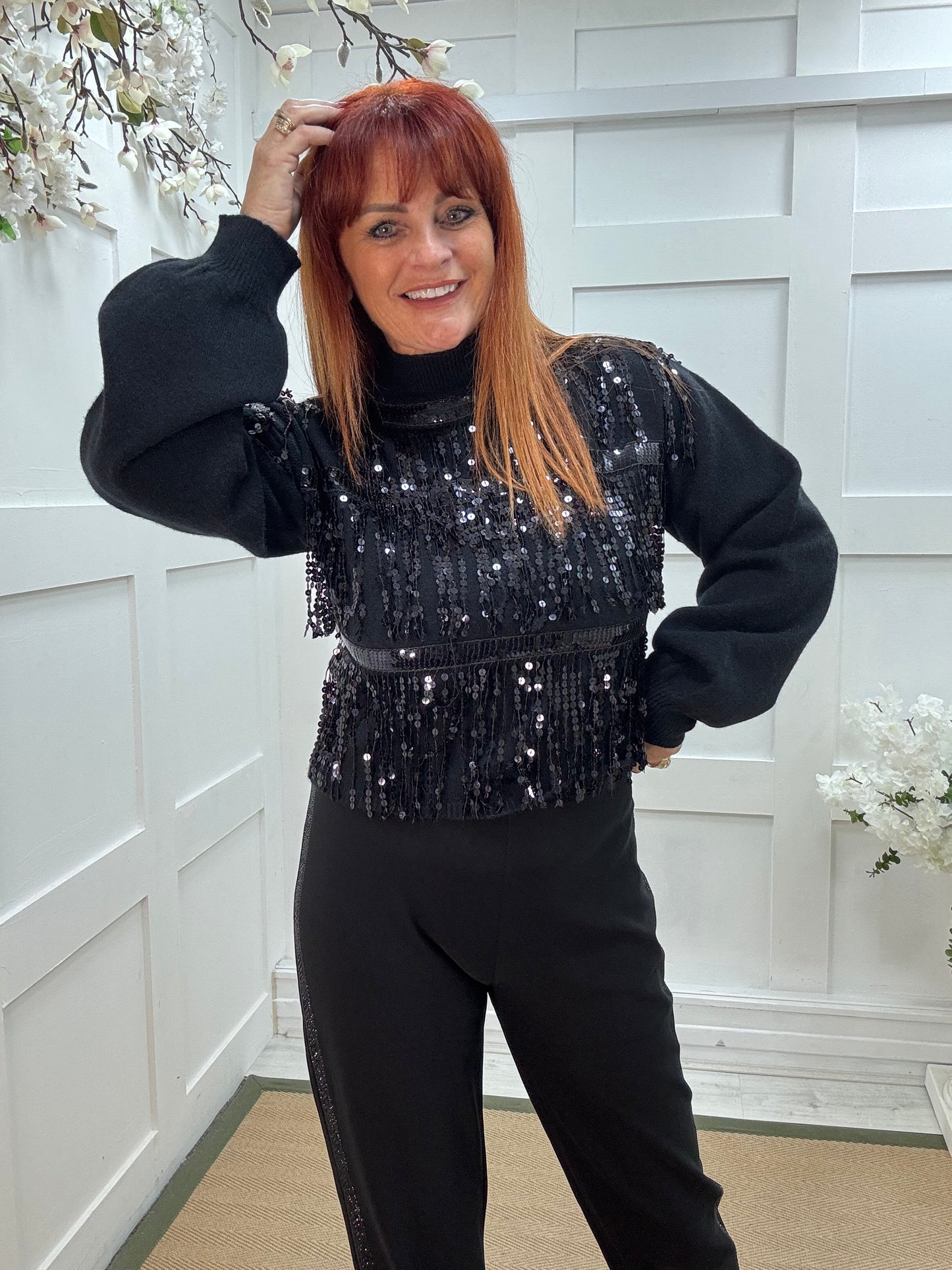 Pixi: Black tassel sequin knit. Two sizes.