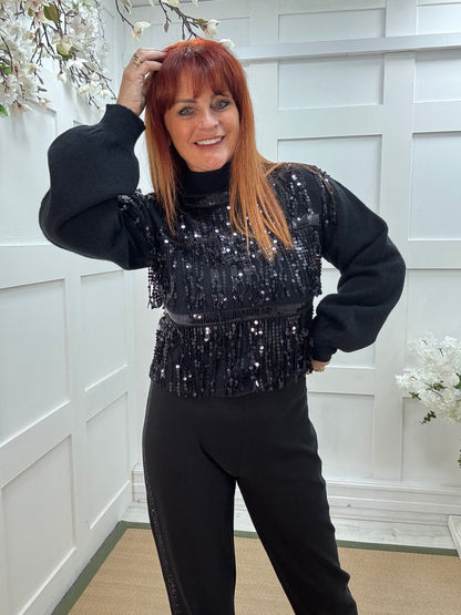 Pixi: Black tassel sequin knit. Two sizes.