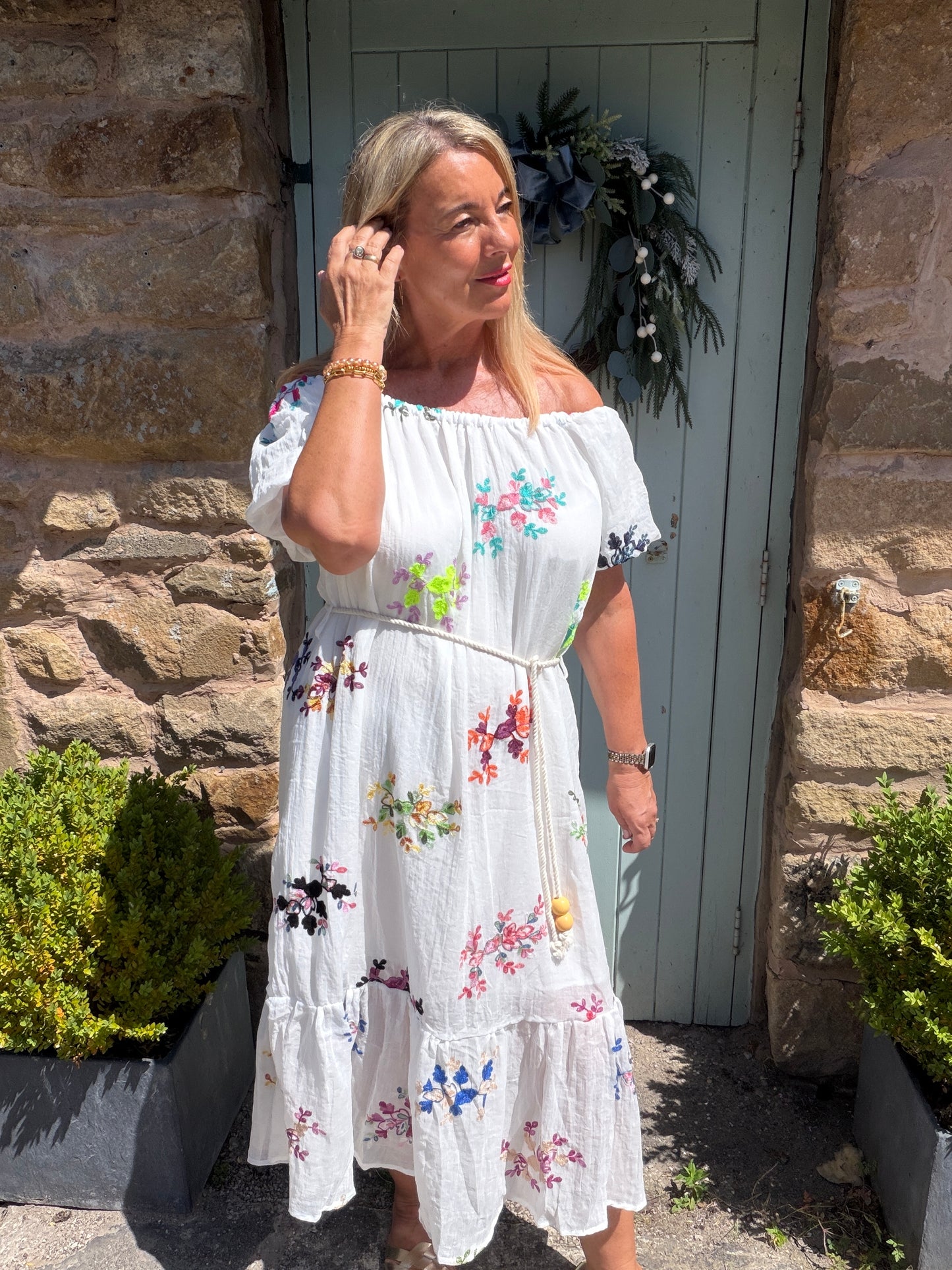 Minnie: Multicoloured embroidered floral bardot maxi dress. One size: 12-16