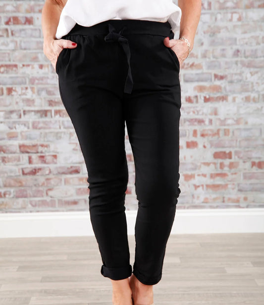 Marnie: Stretchy black magic trousers with rear pockets. 3 Sizes: 10-22