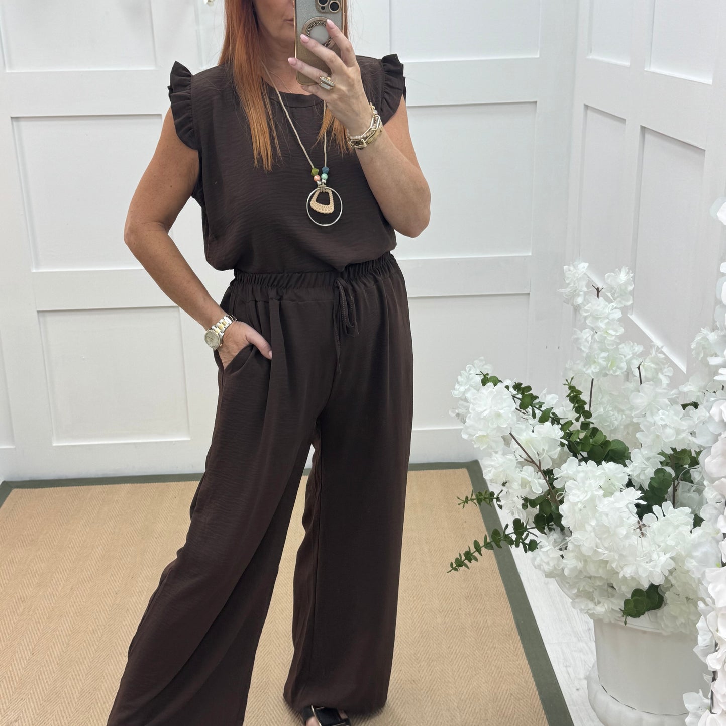 Esme: Brown pocket wide leg trousers. One size: 12-20