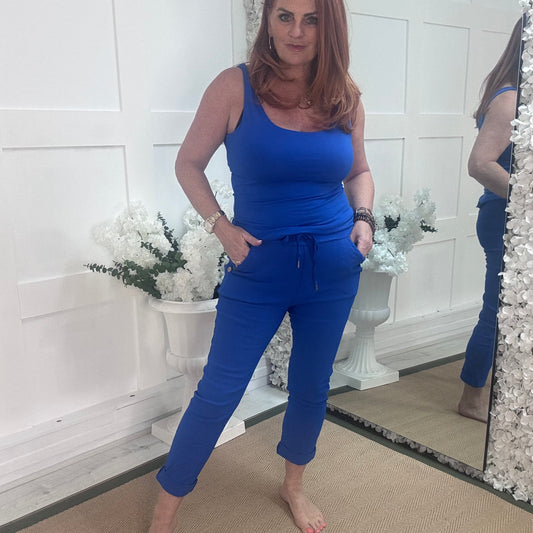 Betsy: Stretchy cobalt blue button magic trousers. One size: 10-14
