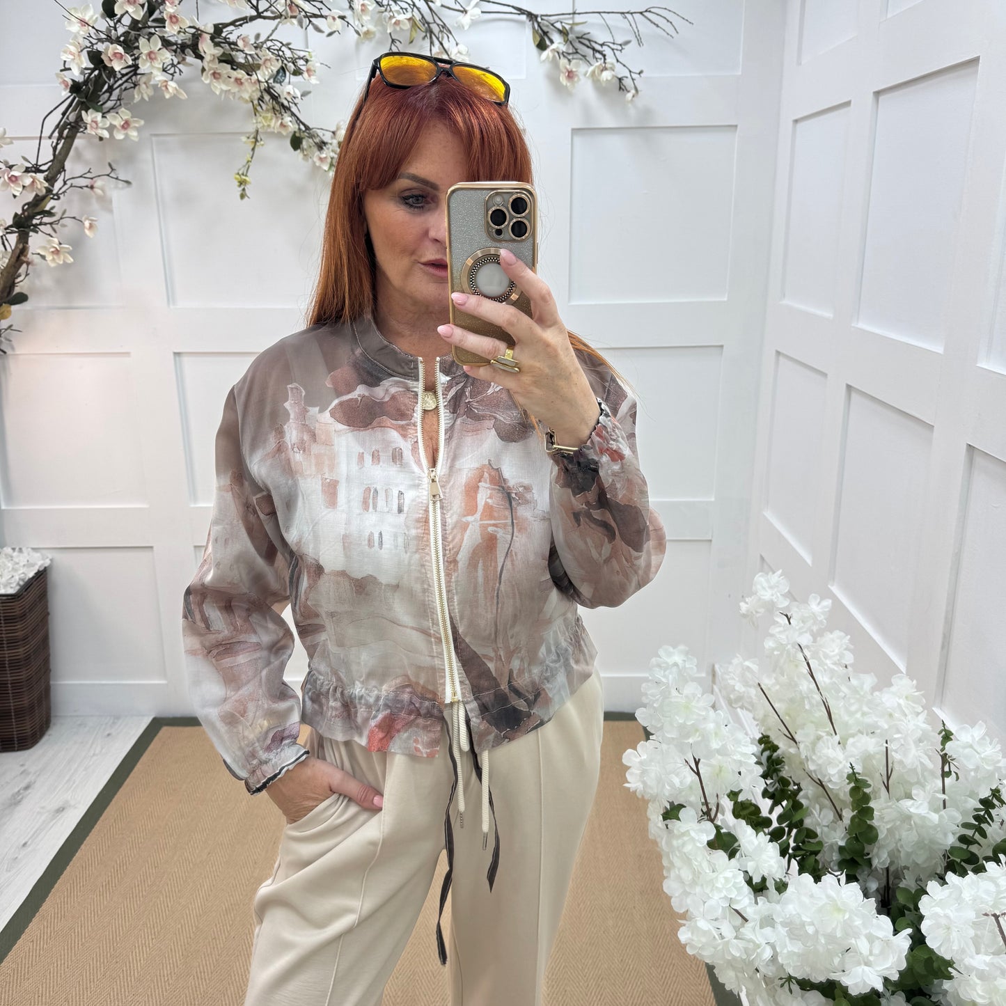 Kira: Silky brown Amalfi printed bomber jacket. One size: 8-16