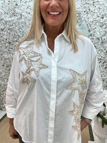 Stella: White sequin star shirt. One size: 16-20