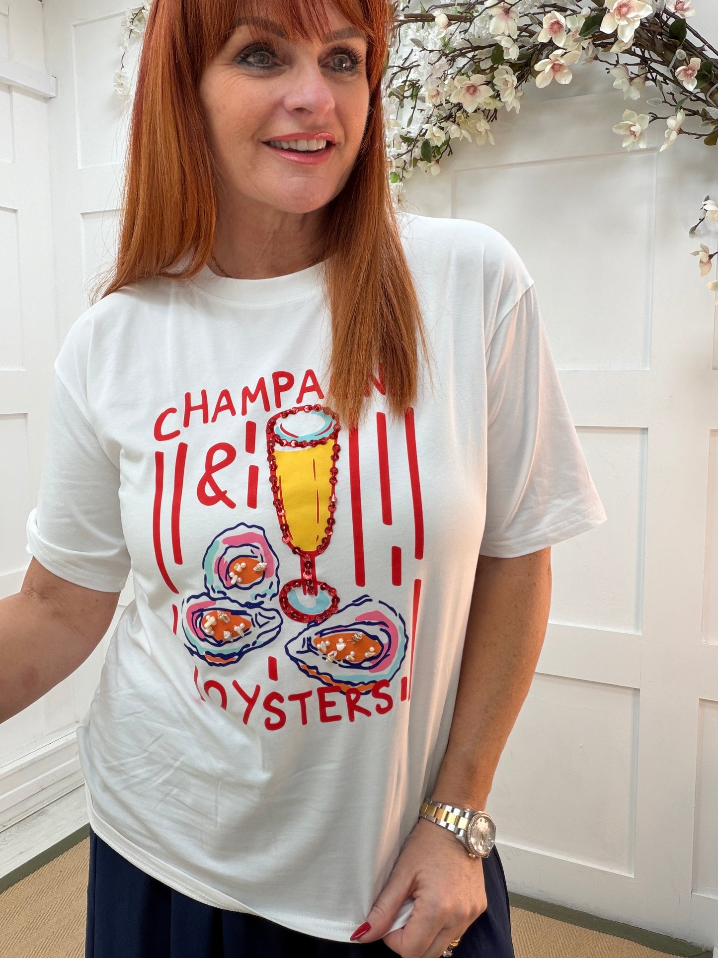 Orla: White & red “champagne & oyster” T shirt. 2 sizes.