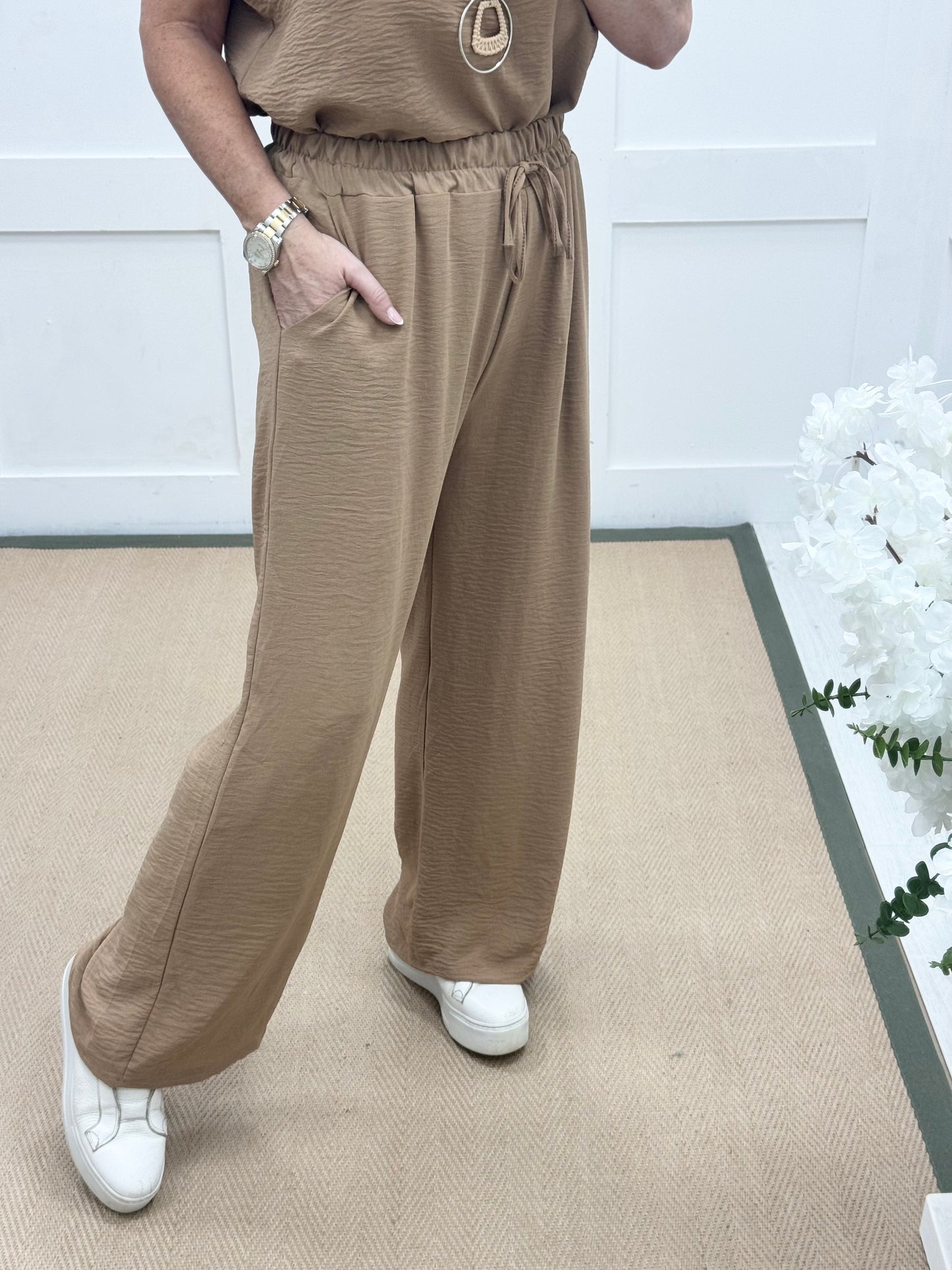 Esme: Sand pocket wide leg trousers. One size: 12-20
