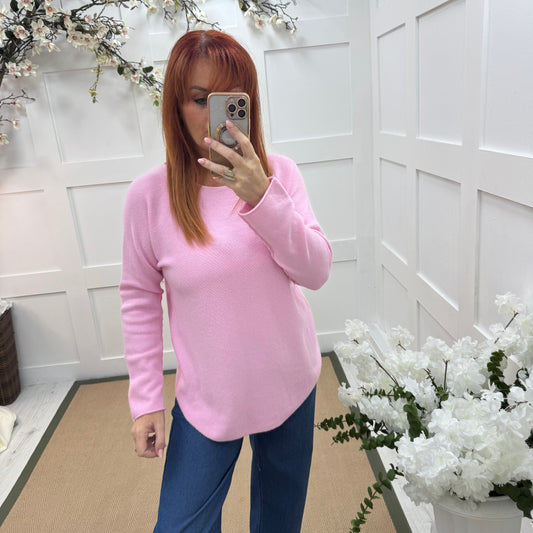 Mindy: Pink plain long sleeve knit top. One size: 10-16/18