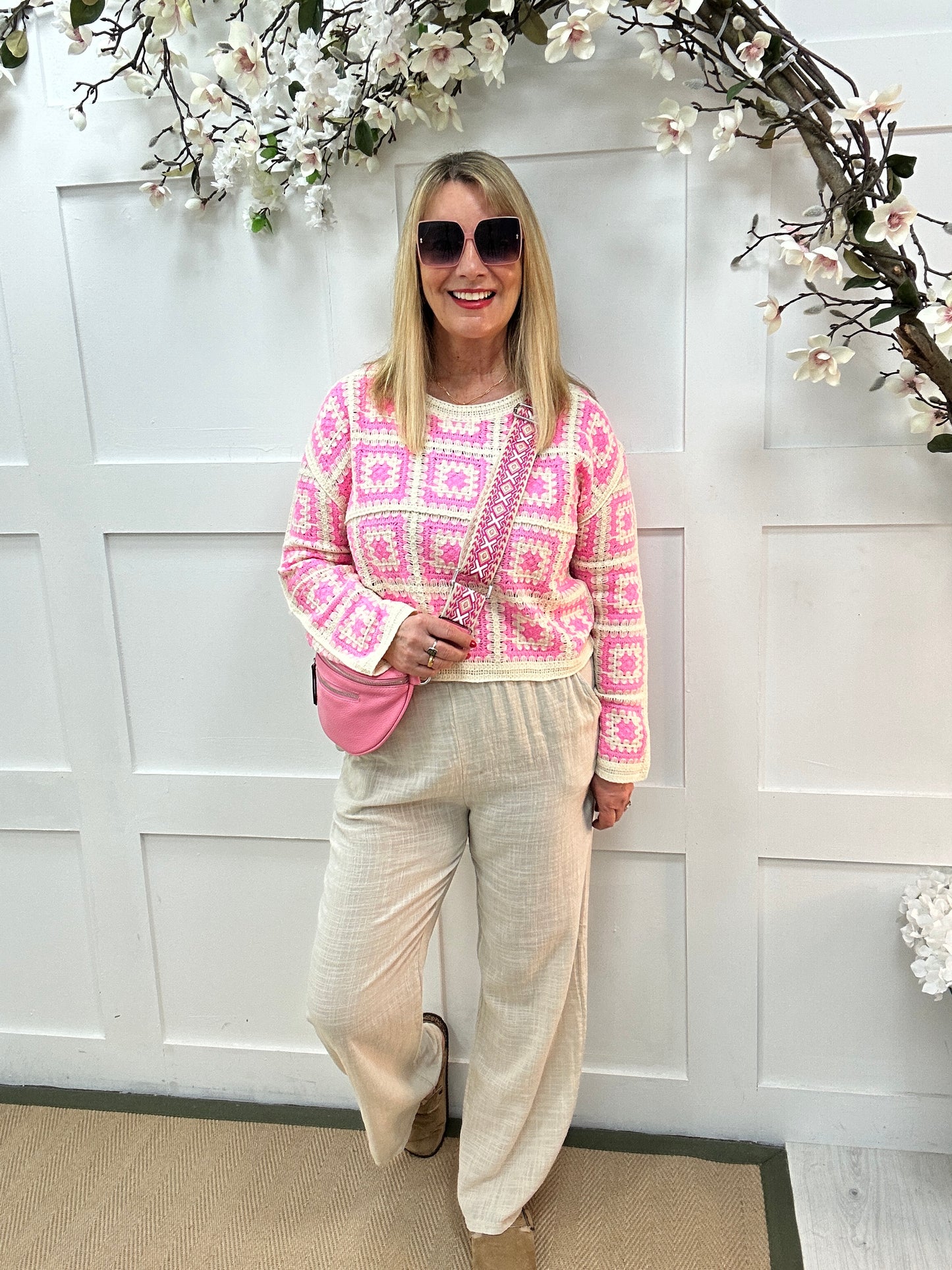 Carly: Pink and cream long sleeve crochet top. One size: 14-18