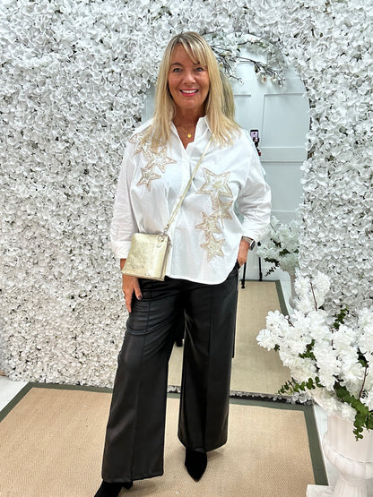 Stella: White sequin star shirt. One size: 16-20