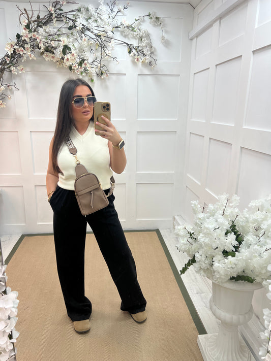 Tara: Cream V neck tank top. One size: 10-14