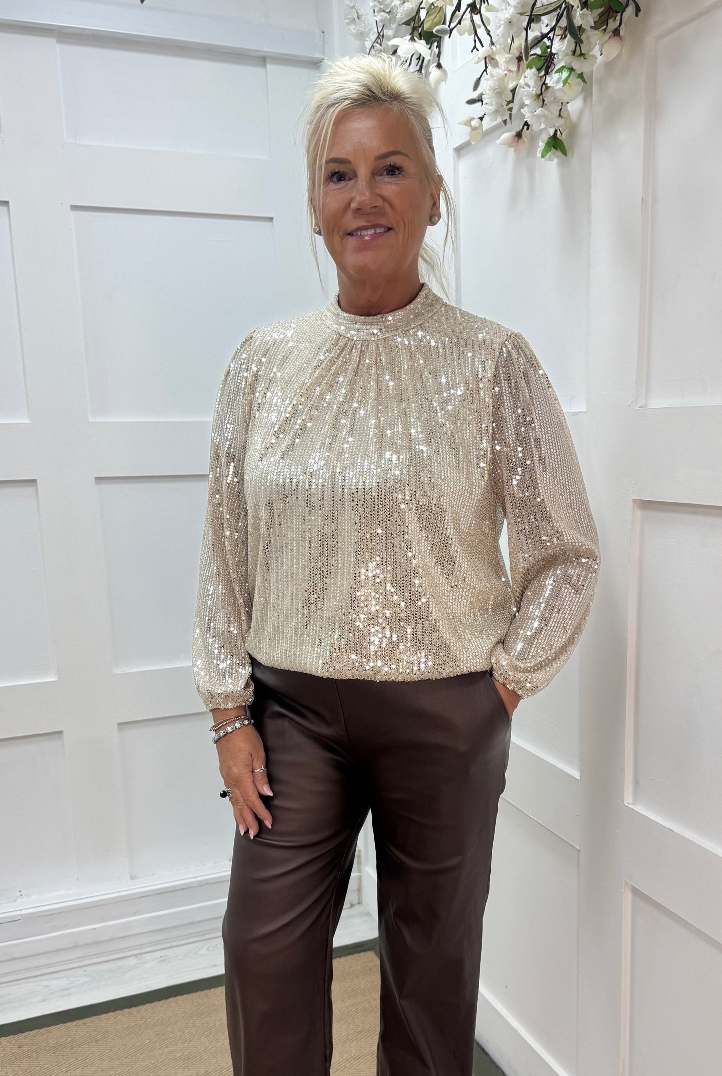 Mia: Champagne/cream high neck sequin top. One size: 10-16