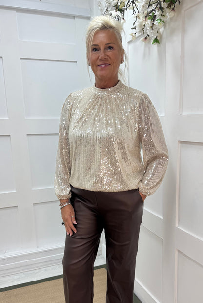 Mia: Champagne/cream high neck sequin top. One size: 10-16