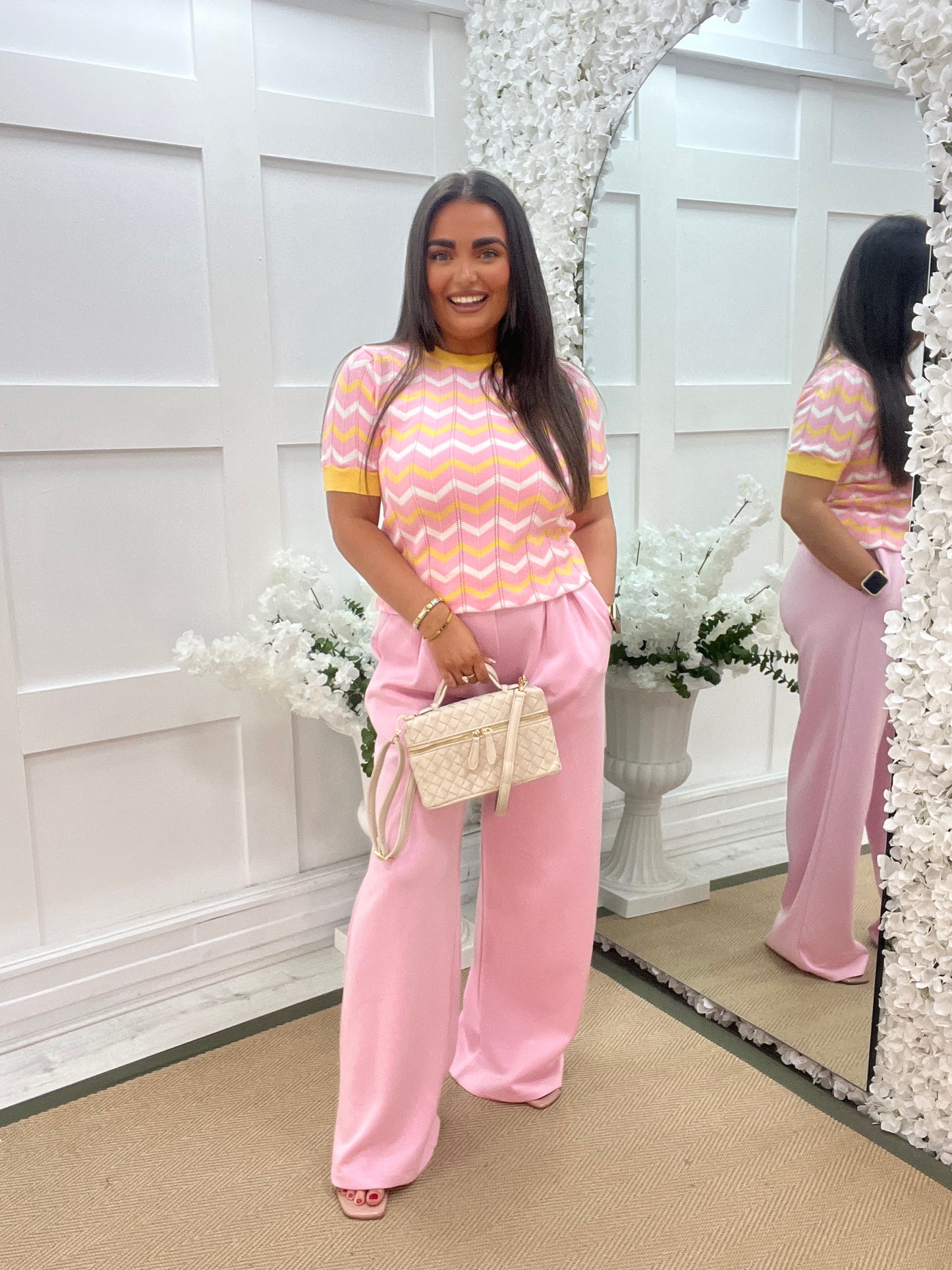 Kaya: Pink, white and yellow chevron short sleeved top. One Sz: 10-14