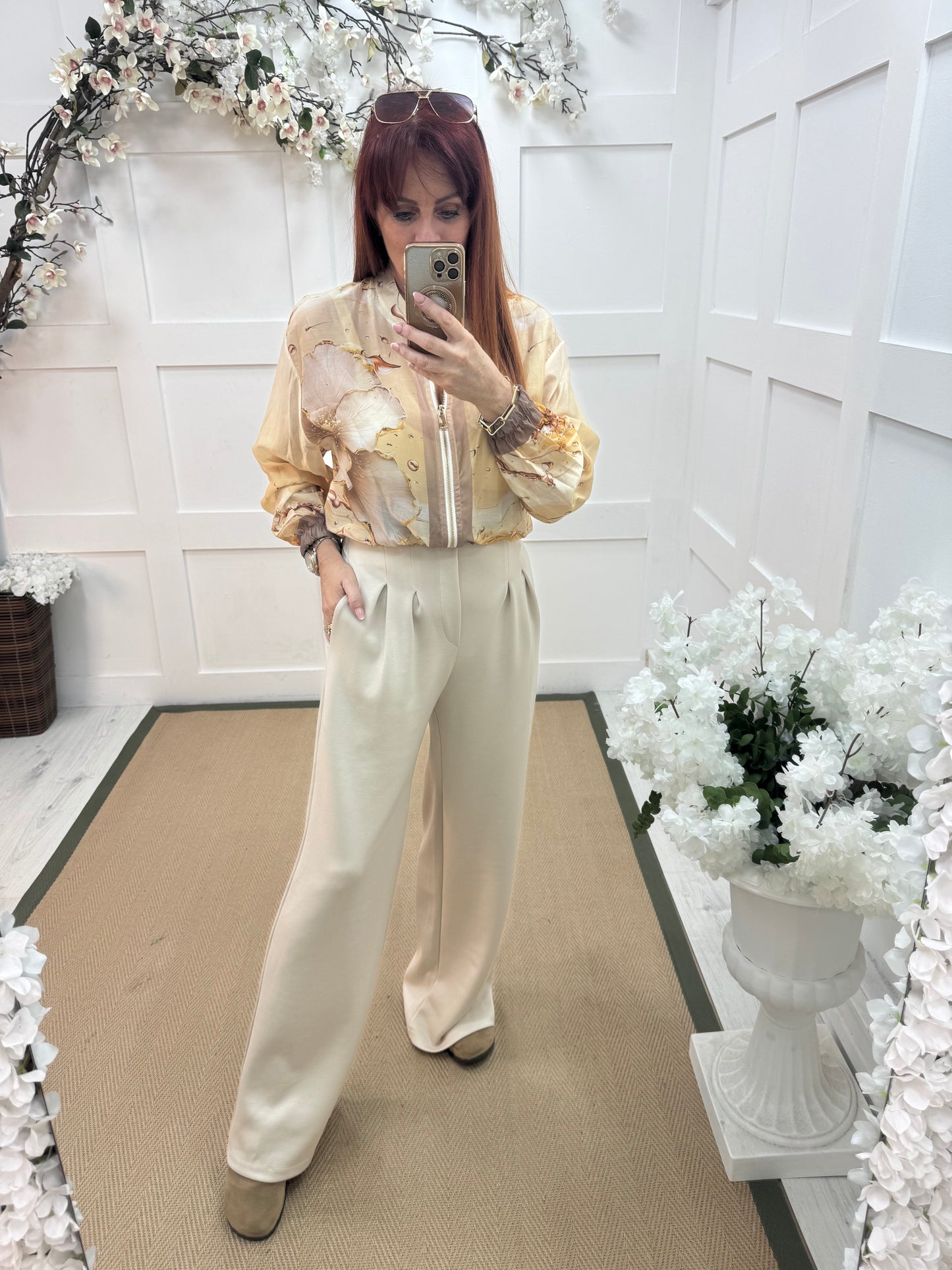 Tayla: Cream high waisted pleated wide leg trousers. One size: 10-16