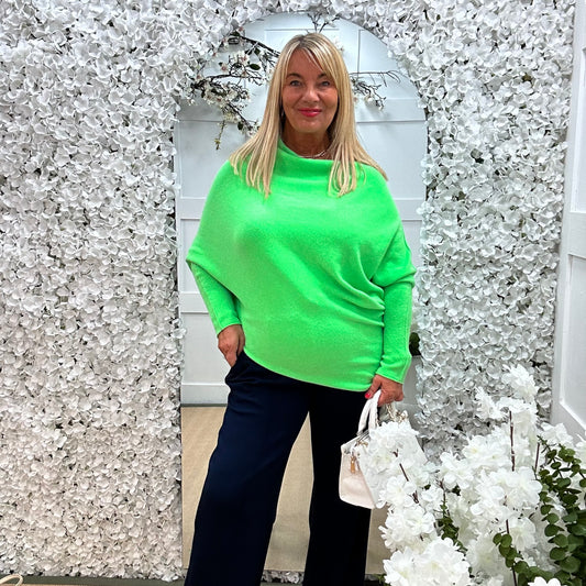 Marcie: Neon lime asymmetrical plain slouch soft knit top. One size 10-18