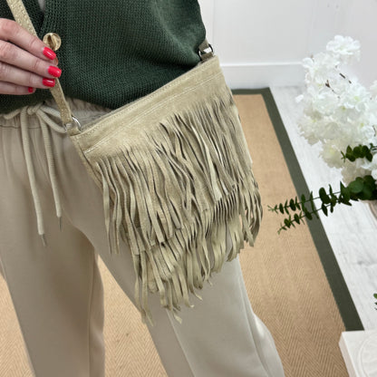 Tanya: Cream real suede tassel cross body bag.