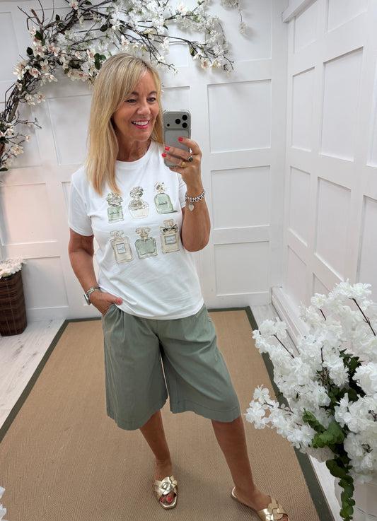 Priya: White & khaki 3D perfume T shirt. One size: 10-16
