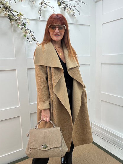 Kathie: Sand boucle coat with pockets. One size 12-18