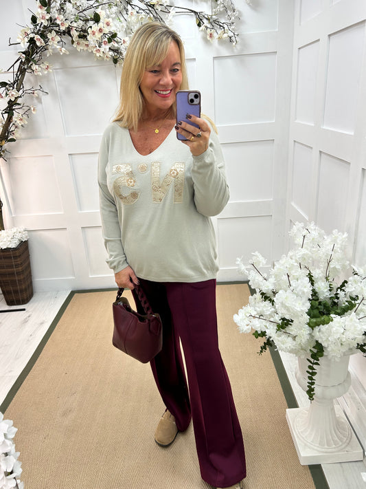 Cass: Stone V neck diamanté No5 knit top. One size: 14-20