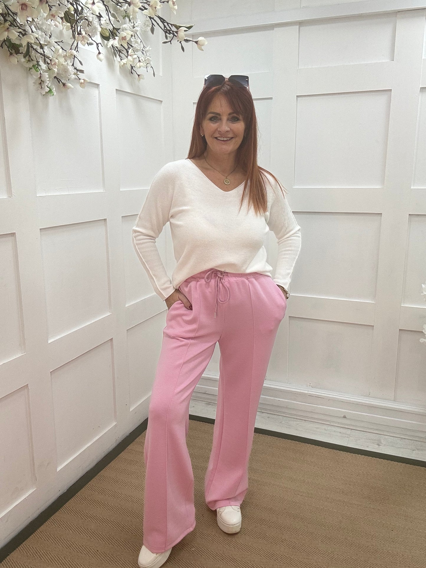 Trudy: Pink stretchy wide leg pocket trousers. 2 sizes