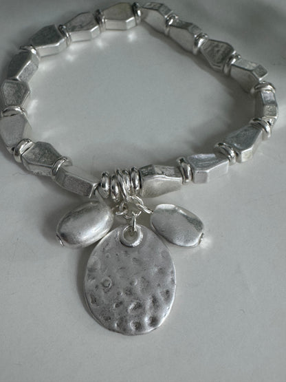 Shana: Silver metal charm bracelet