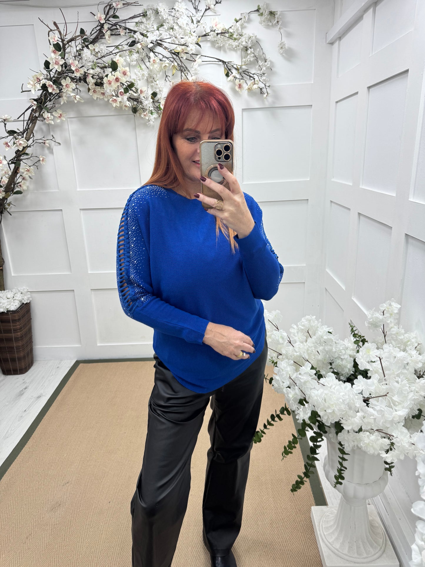 Arianne: Blue sparkle cutout shoulder top. One size: 12-16