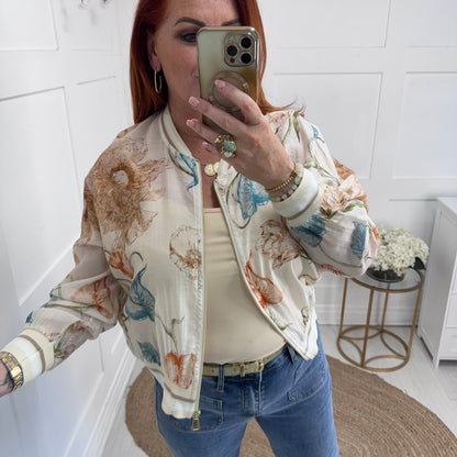Everly: Silky beige floral bomber jacket. One size: 8-16