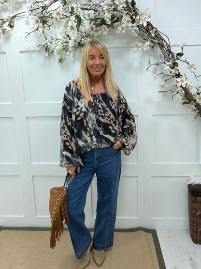 Farah: Blue animal print blouse. One size: 14-20