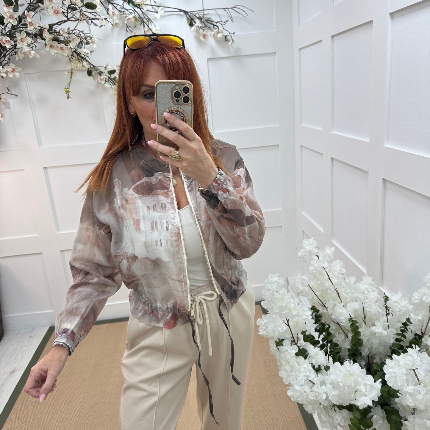Kira: Silky brown Amalfi printed bomber jacket. One size: 8-16