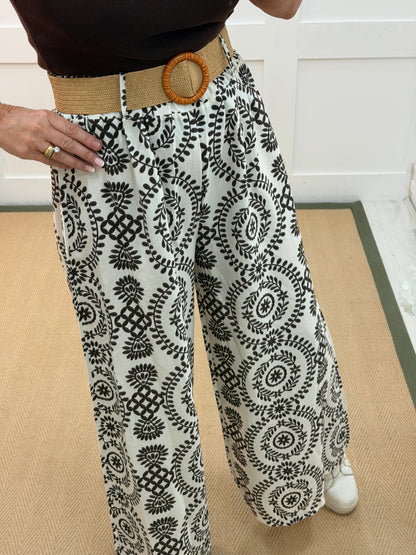 Florrie: Floral wide leg belted trousers. One size: 10-16. 2 colours