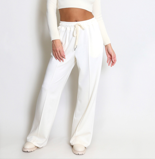 Trudy: White stretchy wide leg pocket trousers. 2 sizes