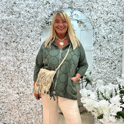 Tanya: Cream real suede tassel cross body bag.