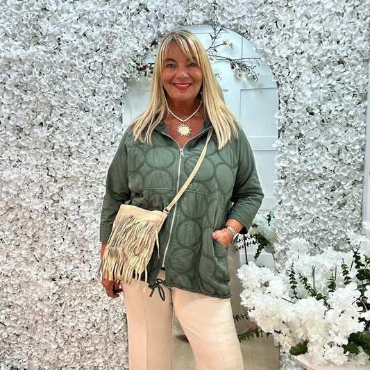 Tanya: Cream real suede tassel cross body bag.