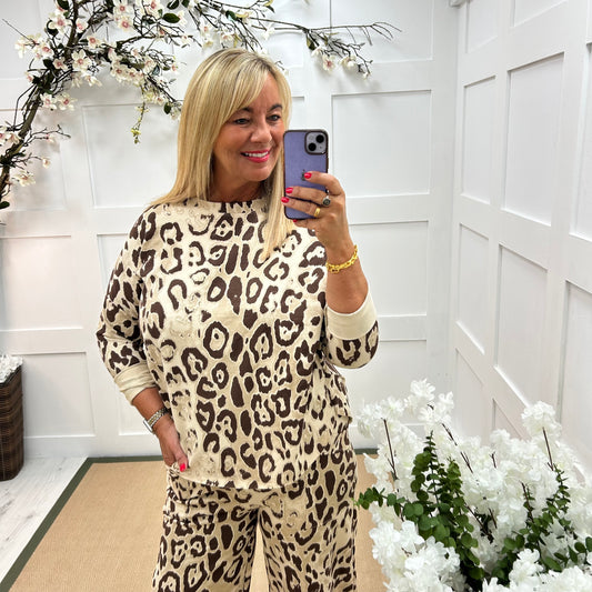 Ronnie: Beige leopard print sweatshirt top. One Sz: 10-18