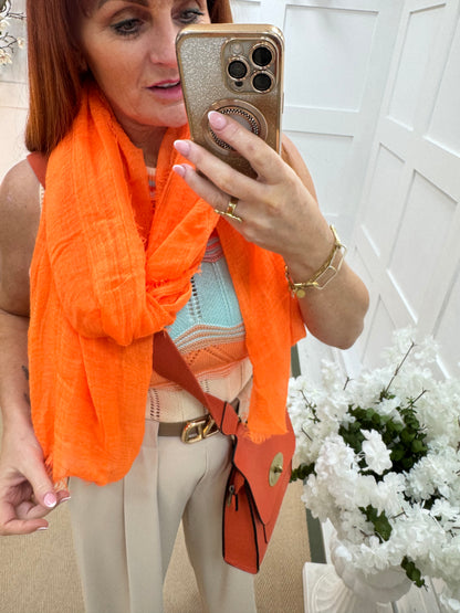 Tula: Neon orange long frayed raw edge scarf. One size