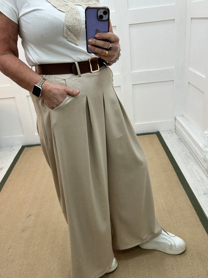 Zina: Beige pocket wide leg trousers. One size: 10-16