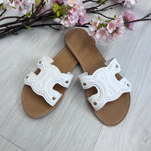 Lucia: white cut out style sliders. Sizes: 4-9