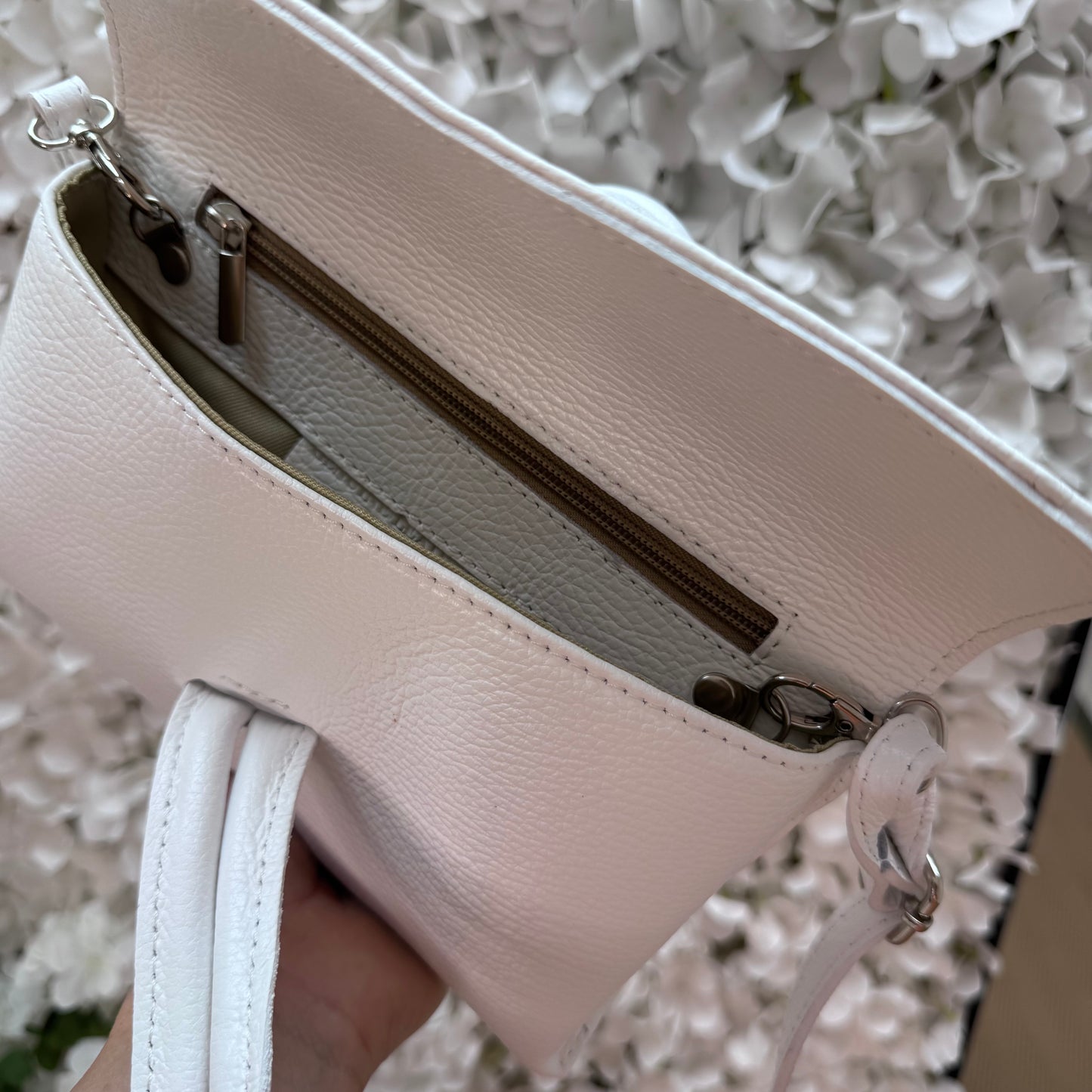 Alexis: White leather loop handle cross body/clutch bag.