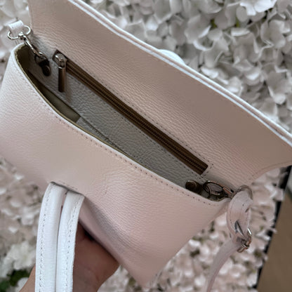 Alexis: White leather loop handle cross body/clutch bag.