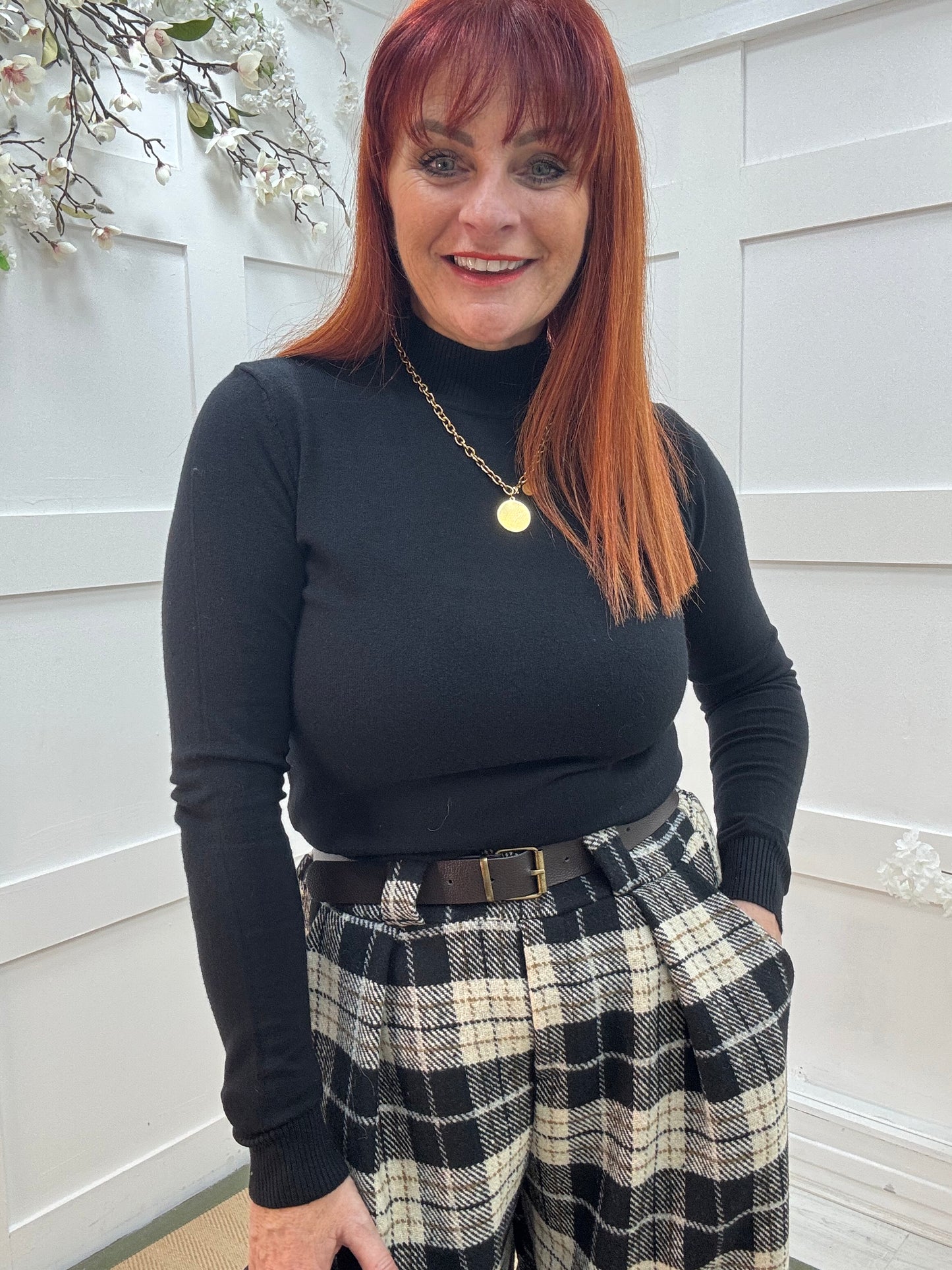 Billie: Black high neckline plain top. Two sizes.