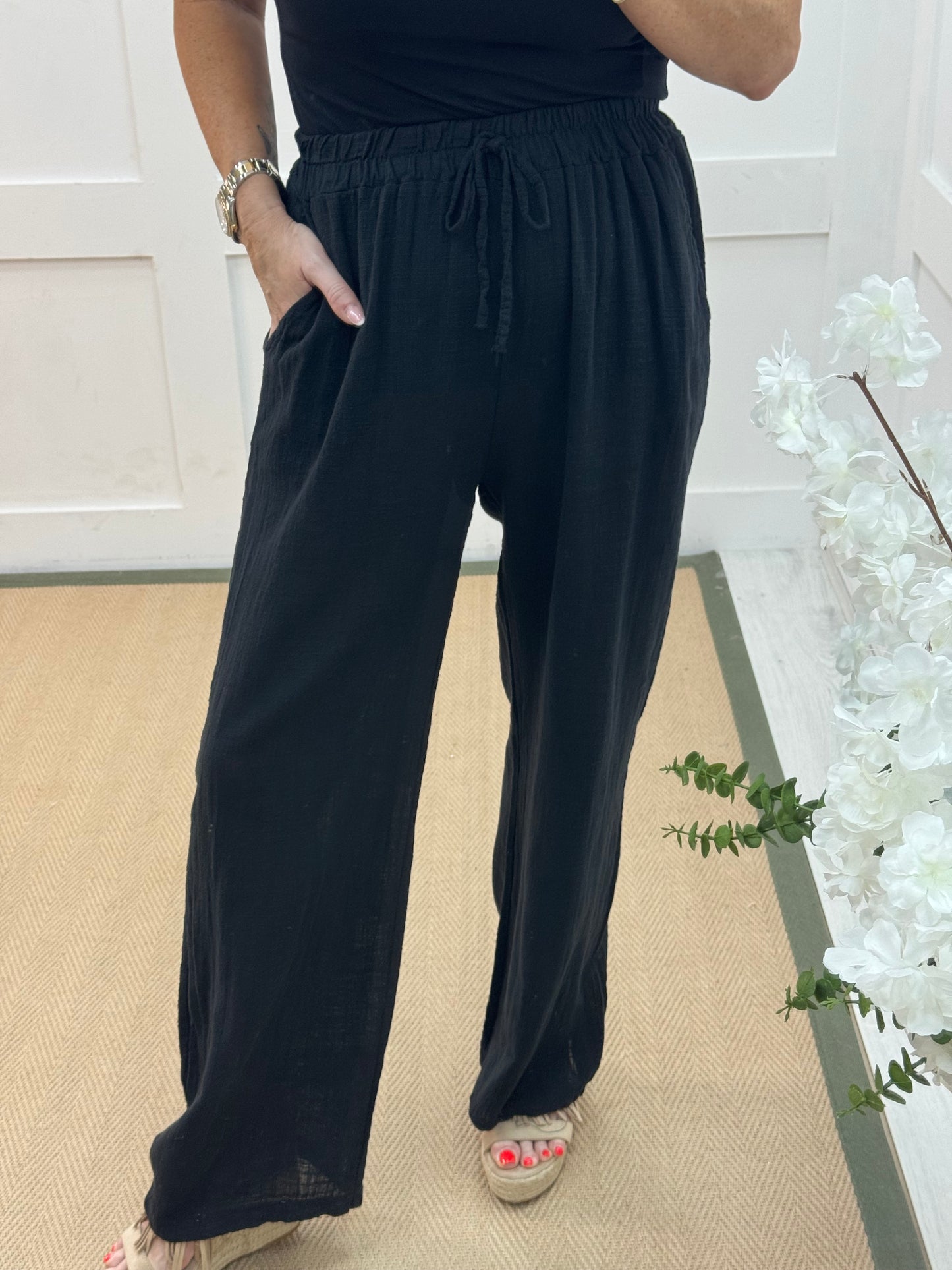 Tori: Black cotton wide leg trousers. One size: 8-16