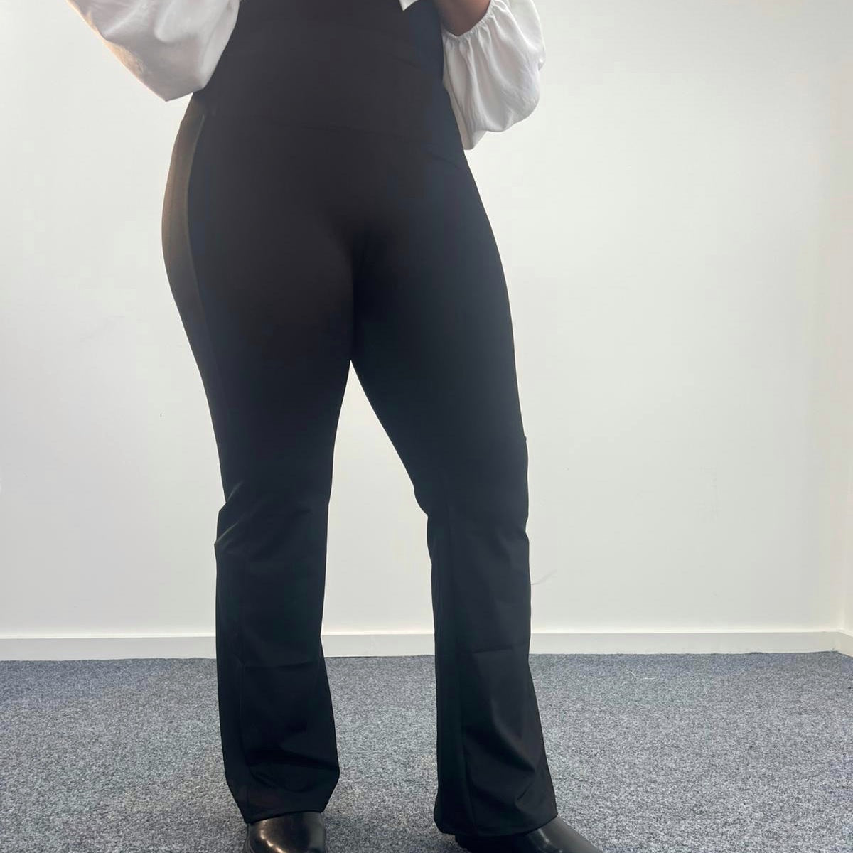 Alexis: Black tummy control flared pants. 3 sizes