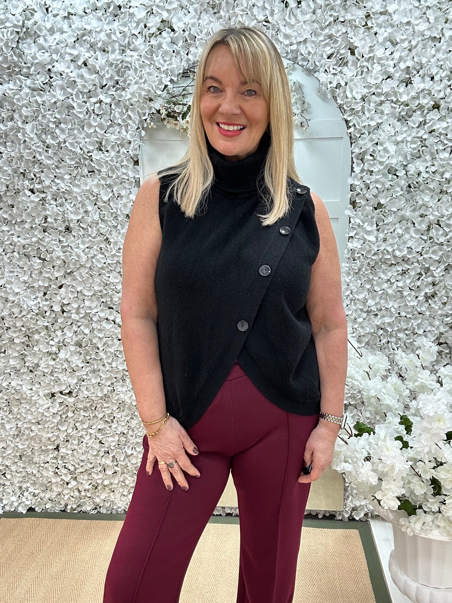 Carmen: Black sleeveless cowl neck wrap top. One Sz: 10- 16