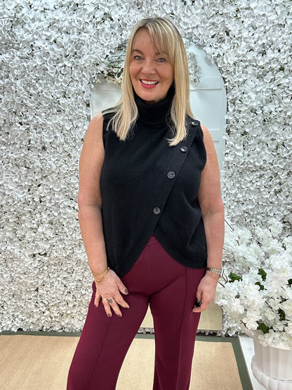 Carmen: Black sleeveless cowl neck wrap top. One Sz: 10- 16