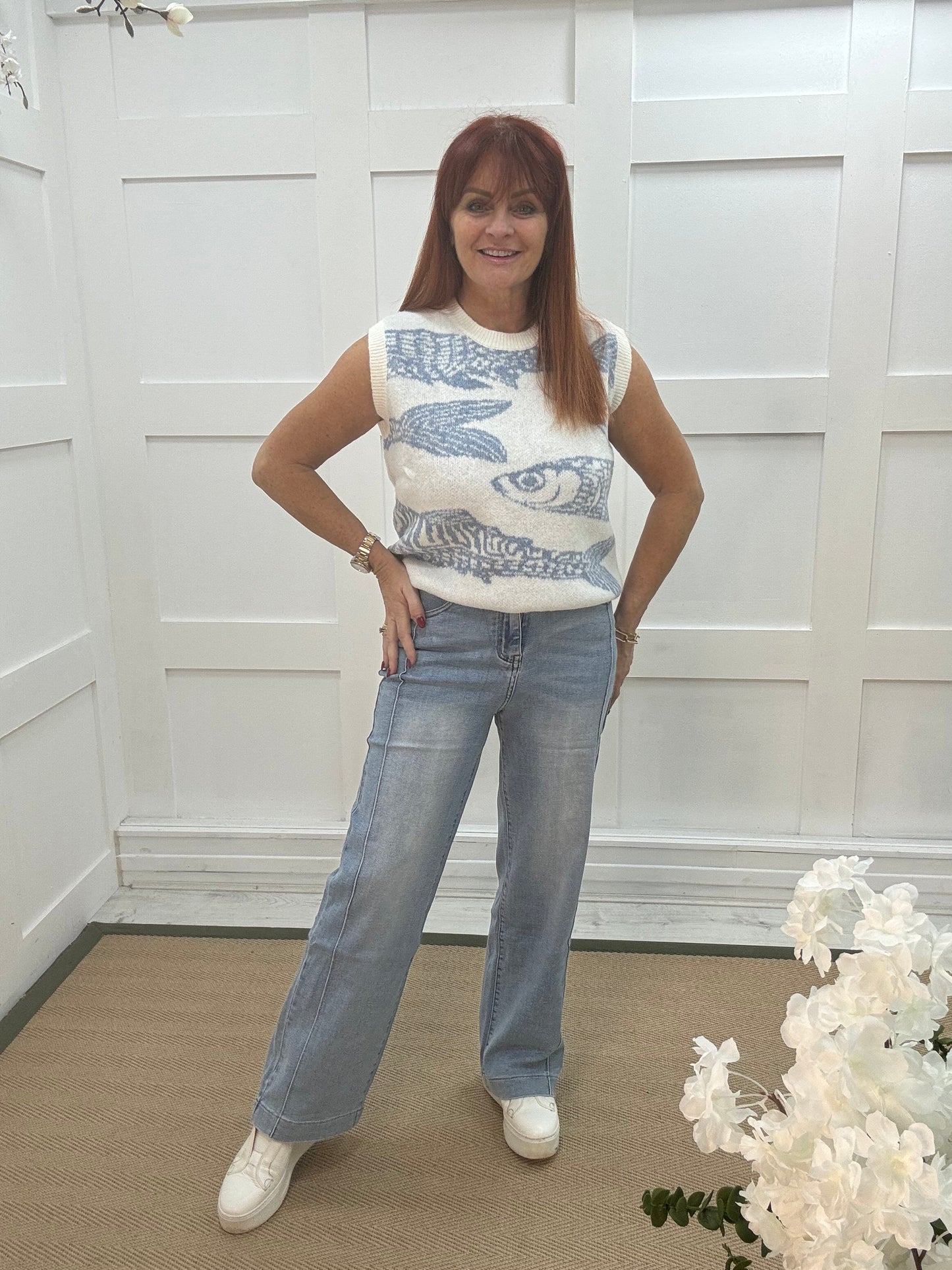 Nancy: Washed denim high waist wide leg jeans. Sizes: 8-18